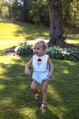 Charlie Button-On Sunsuit Lined in Blue Swiss Dots